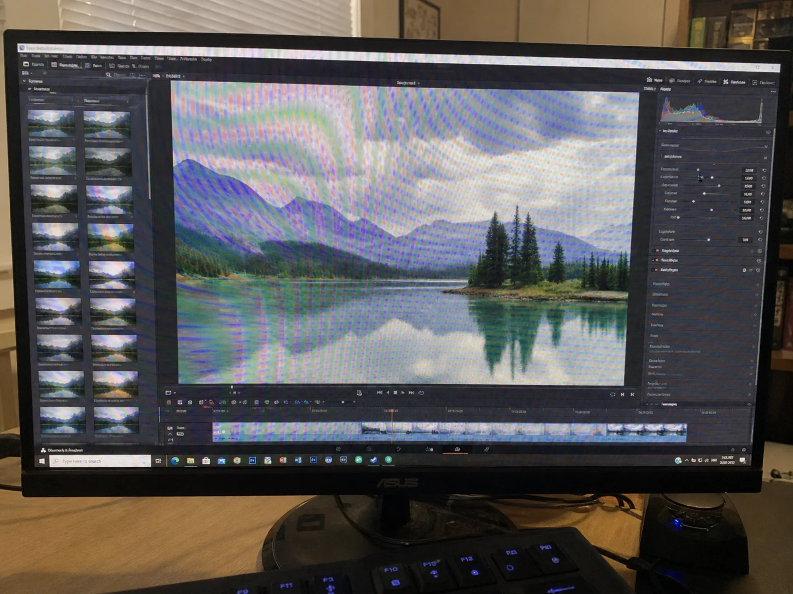 Smartphone photo of a monitor with rainbow moire before removal